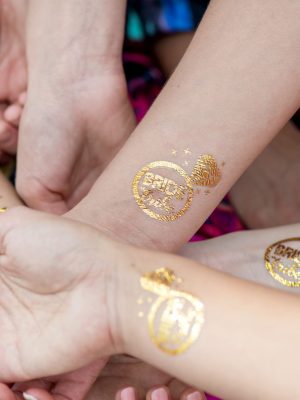 Macro,Shot,Of,Temporary,Tattoo,Of,A,Ring,On,Bridesmaids